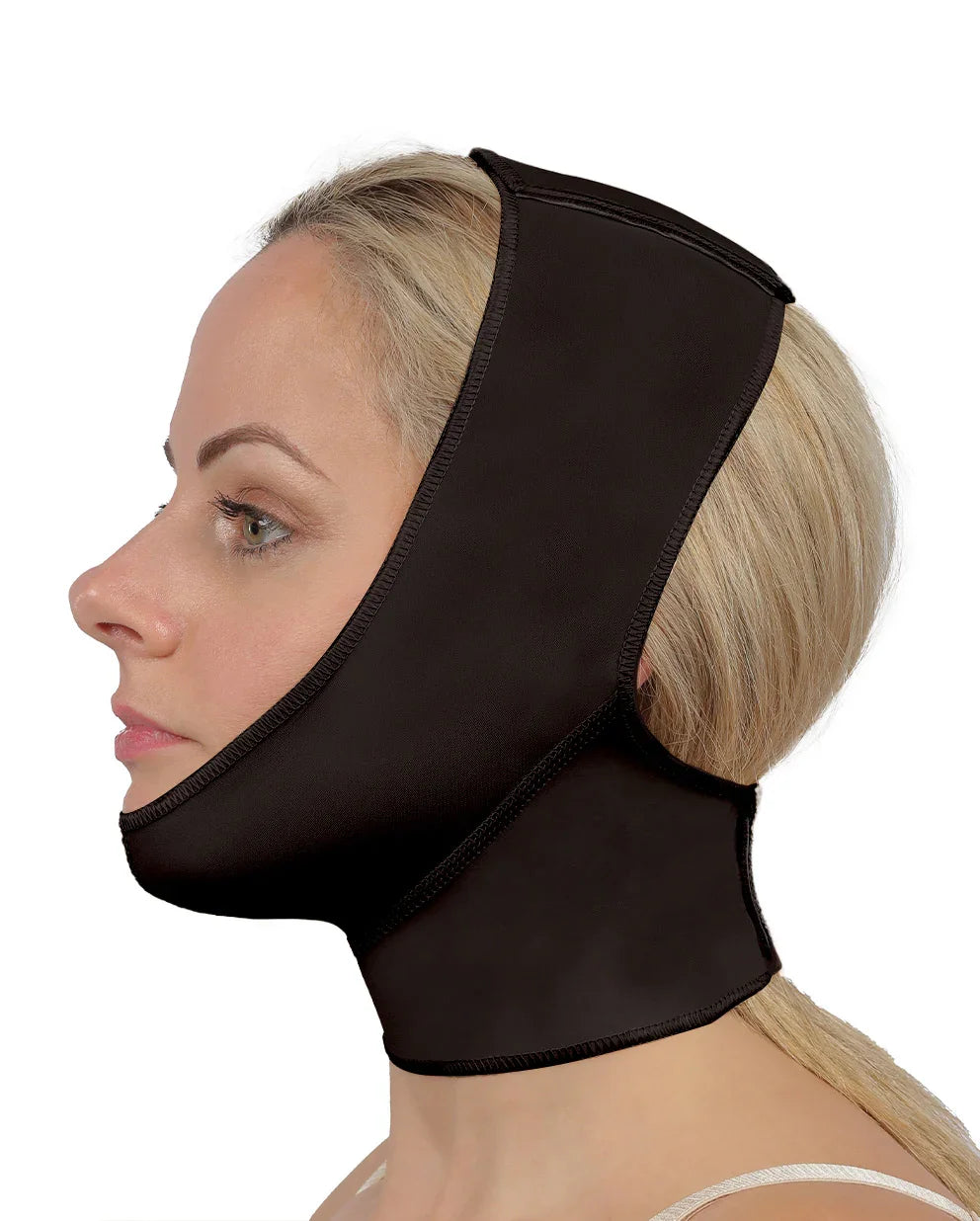 Side profile of the Mento facial wrap, showcasing the non-slip dome design that ensures the garment stays in place for effective recovery compression.