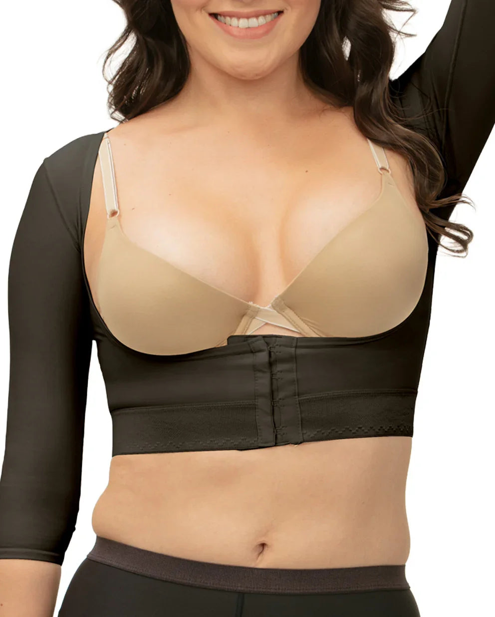 Female model wearing black post surgical compression sleeves