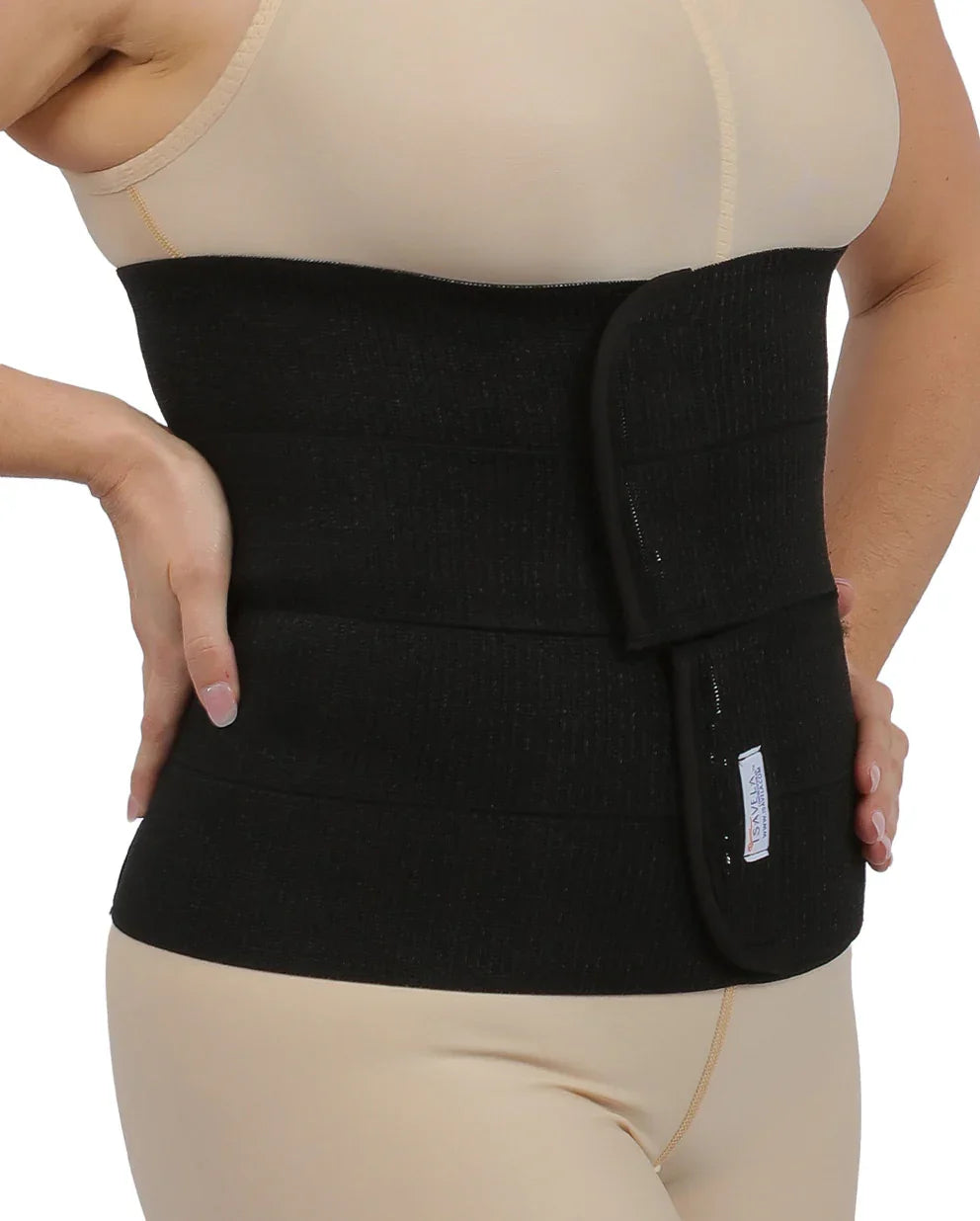 Black waist support belt worn by a person on a white background